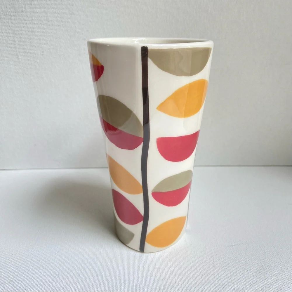 Pier 1 tall asymmetrical oval coffee mug with abstract fall leaves and stripes
